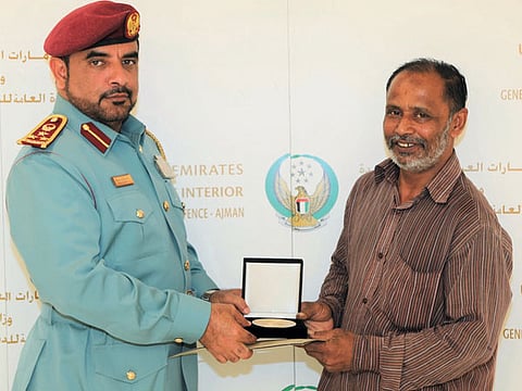 Ajman Civil Defence honoured Farouk Islam Nour Al Haq, a Bangladeshi national, for saving the life of a three-year-old boy who was flung from a burning building.