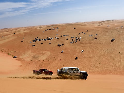 Participants enjoy in the desert enroute Moreeb dune in Abu Dhabi during the Gulf News Overnighter Fun Drive 2019.