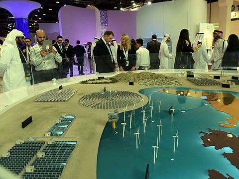 Visitors and delegates check out the solar project of Masdar City at their pavilion after the opening of Abu Dhabi Sustainability Week at Adnec, earlier. ADSW 2022 is scheduled to be held from January 15-19. Picture for illustrative purposes only.