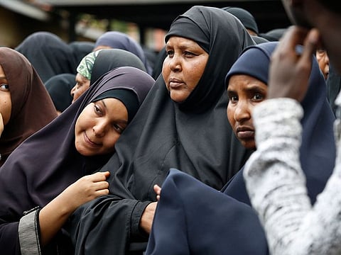 Family members including the mother of Abdalla, center, prepare to pray over the bodies of Abdalla Dahir and Feisal Ahmed, who were both killed in Tuesday's attack, at a mosque in Nairobi, Kenya Wednesday, Jan. 16, 2019.