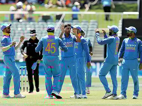 India's Bhuvneshwar Kumar (centre) celebrates the wicket of Australia's Aaron Finch during their one day international cricket match in Adelaide, Australia, Tuesday, January 15, 2019.