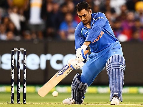 M.S. Dhoni plays a shot during the third ODI against Australia at the Melbourne Cricket Ground, on Friday, January 18, 2019.