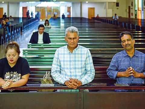 (Front row, from left) Lucilla Buella, Victor Robert D’Souza and Rajan Dasan at St Mary’s Church in Dubai to offer thanks after amnesty gave them a chance to stay legally in the UAE.