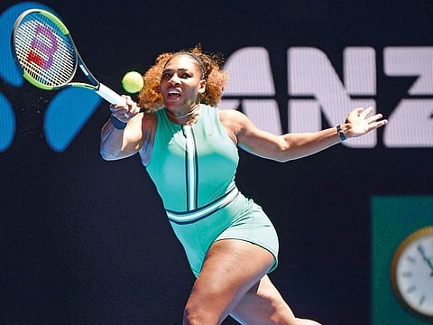 Serena Williams powers a forehand return against Dayana Yastremska during their women’s singles match at the Australian Open in Melbourne yesterday. The American won 6-2, 6-1.