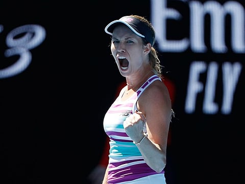 Danielle Collins of the US celebrates during the match against Germany's Angelique Kerber.