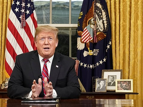 U.S. President Donald Trump delivers a televised address to the nation from his desk in the Oval Office about immigration and the southern U.S. border on the 18th day of a partial government shutdown at the White House in Washington, U.S., January 8, 2019. He is now calling for a 'compromise'.