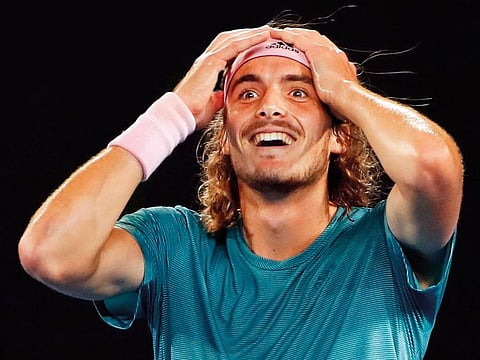 Stefanos Tsitsipas reacts after defeating Roger Federer in the fourth round of the Australian Open at the Melbourne Park.