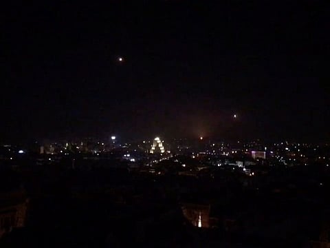 What is believed to be guided missiles are seen in the sky during what is reported to be an attack in Damascus, Syria, January 21, 2019, in this still image taken from a video obtained from social media.