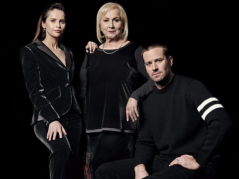 Felicity Jones, left, who plays Supreme Court Justice Ruth Bader Ginsburg in the new film “On the Basis of Sex,” with the director Mimi Leder and her co-star Armie Hammer, right, in New York.