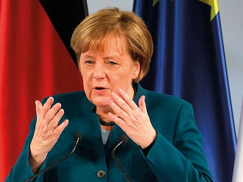 Angela Merkel delivers a speech during the French-German friendship treaty signing ceremony