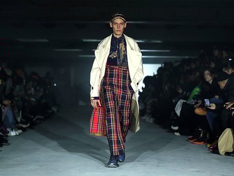 A model presents a creation by designer Hedi Slimane as part of his Fall/Winter 2019-2020 collection show for fashion house Celine during Men's Fashion Week in Paris, France, January 20, 2019.