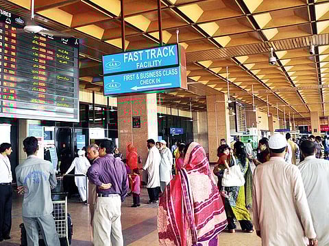 Passengers at Jinnah International Airport in Karachi. The Dubai to Karachi route is seeing tickets as low as Dh832.