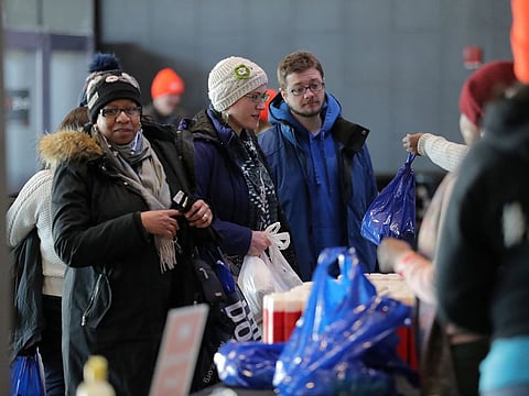 Government employees receive donations at a food distribution center for federal workers impacted by the government shutdown, at the Barclays Center in the Brooklyn borough of New York, U.S., January 22, 2019.