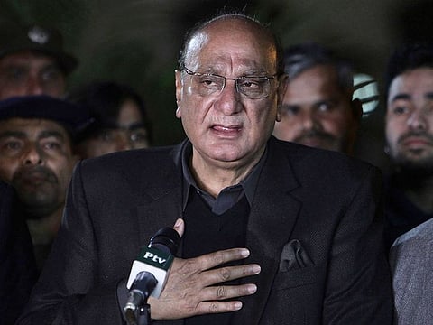 Pakistan's law minister Raja Bisharat addresses a news conference in Lahore, Pakistan, on Tuesday.
