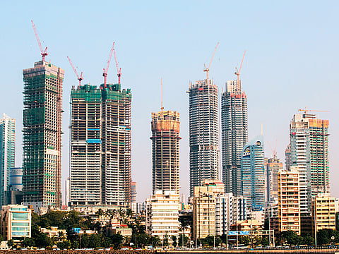 NRIs should give real estate in India a closer look... in times of uncertainty, the sector has given them solid returns in the past.