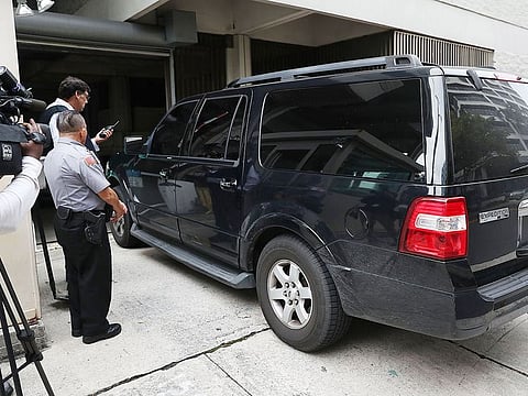 A vehicle believed to be carrying Roger Stone, a former advisor to President Donald Trump, arrives at the Federal Courthouse on January 25, 2019 in Fort Lauderdale, Florida.