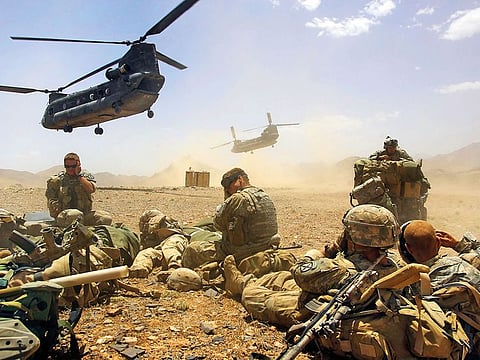 American soldiers being picked up by helicopter in the village of Hazarbuz in Afghanistan. The US and the Taliban are closing in on a deal to end America’s longest war