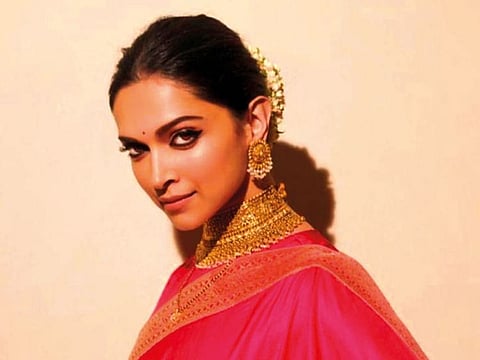 Deepika Padukone in a Raw Mango sari.