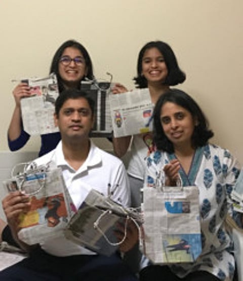 Bhumika Aparanji and family with paper bags