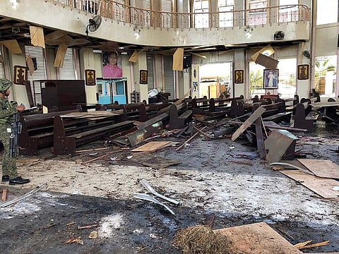 Debris inside a Catholic Church where two bombs exploded in Jolo, Sulu province on the southern island of Mindanao.