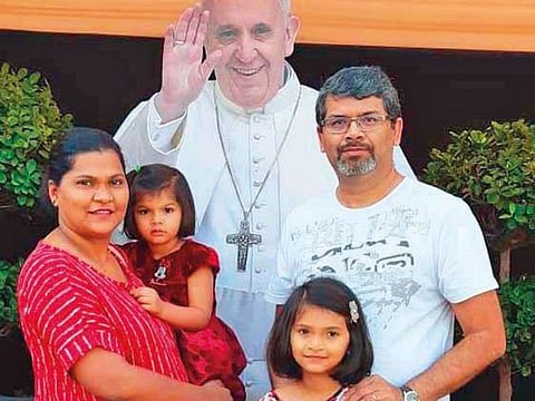 Susan and Rajiv Mascarenhas and their daughters