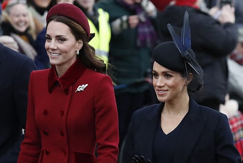 Britain’s Catherine, Duchess of Cambridge, and Meghan, Duchess of Sussex.
