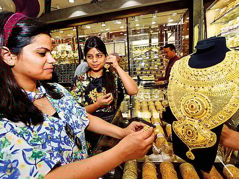 Shoppers check out a bridal jewellery set weighing 630.92 grams at a Kanz Jewellery in Deira Gold Souq. In recent years, UAE jewellery sales have averaged in the 50-tonne plus range.