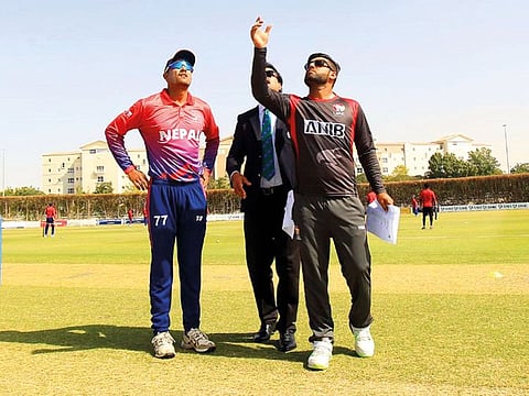 The UAE and Nepal captains during the toss.