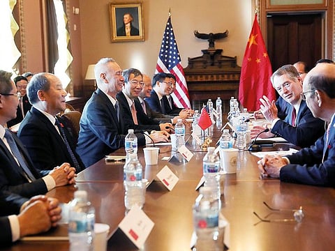 US Trade Representative Robert Lighthizer (second from right) sits across from China’s Vice Premier Liu He (third from left) during US-China Trade Talks in Washington last week.