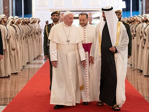 His Highness Shaikh Mohammad Bin Zayed Al Nahyan, Crown Prince of Abu Dhabi and Deputy Supreme Commander of the UAE, welcomes Pope Francis upon the pontiff's arrival in Abu Dhabi.