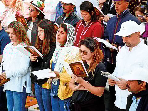 Worshippers from all walks of life take part in the service during the papal mass.