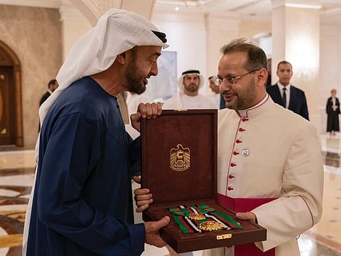 Mohammad Bin Zayed presents the Order of Zayed II, bestowed by the UAE President, to Monsignor Yoannis Lahzi Gaid, the Pope’s second personal secretary