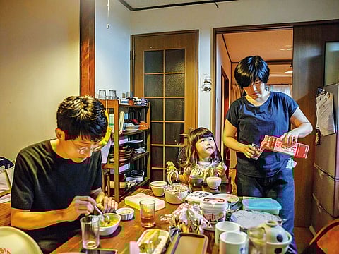 Mothers take care of their children as men in Japan do fewer hours of housework.