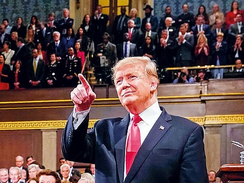 US President Donald Trump arrives to deliver the State of the Union address at the US Capitol