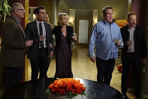 From left: Ed O'Neill, Ty Burrell, Sofia Vergara, obscured, Julie Bowen, Eric Stonestreet and Jesse Tyler Ferguson in a scene from "Modern Family."