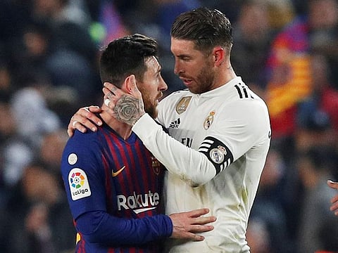 Barcelona's Lionel Messi and Real Madrid's Sergio Ramos.