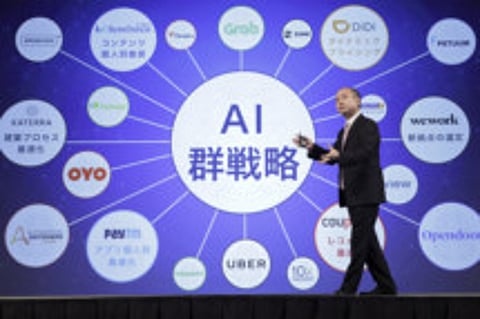 Masayoshi Son speaks during a news conference in Tokyo yesterday. SoftBank is buying back as much as 600 billion yen of stock. Based on his own stake, Son’s net worth rose by about $5 billion after the shares surged.