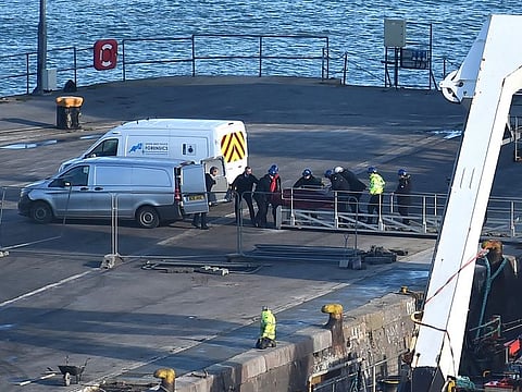 A body is taken off the Geo Ocean III, recovered from the wreckage of a plane carrying Argentine footballer Emiliano Sala at Weymouth harbour, south west England on February 7, 2019.