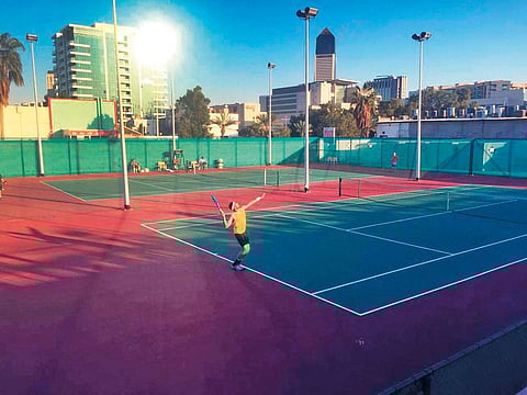 The UAE's Amirvala Madanchi serves to his opponent from Syria (not pictured) on the second day of the 25th ANL Nations Cup that is being held at the ANL tennis courts.