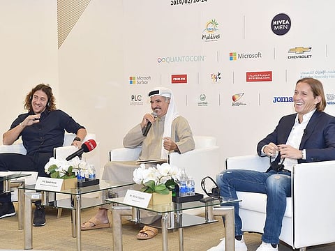 Saeed Hareb addresses the press conference in the presence of Michel Salgado (right) and former Carles Puyol on Friday.