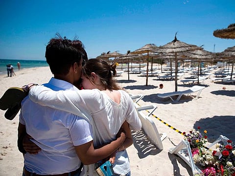File photo: Taken on June 27, 2015, people react at the site of a shooting attack on the beach in front of the Riu Imperial Marhaba Hotel in Port el Kantaoui, on the outskirts of Sousse south of the capital Tunis