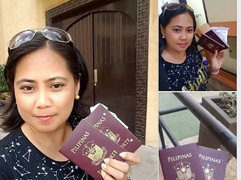 A Dubai-based Filipina shows her passport. A new, long-overdue law (Act No. 11983) mandates the Department of Foreign Affairs (DFA) to make the passport application process more convenient for Filipinos via the DFA website.