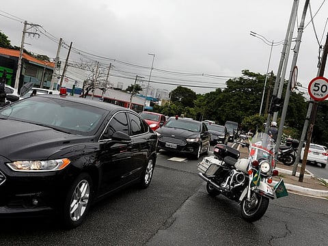 A convoy of vehicles transporting Brazil's President Jair Bolsonaro is seen near the Congonhas airport after leaving the Albert Einstein Hospital in Sao Paulo, Brazil, February 13, 2019.