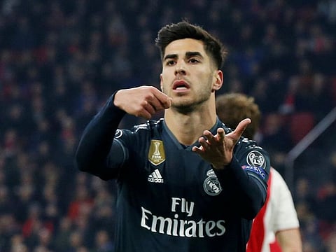 Real Madrid's Marco Asensio celebrates scoring their second goal.