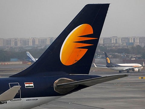 File photo: A Jet Airways plane is parked as other moves to runway at the Chhatrapati Shivaji International airport in Mumbai.