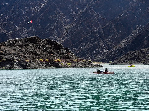 Dubai Police Maritime Rescue Univt recover sunken valuable of a tourist from Hatta Dam.
