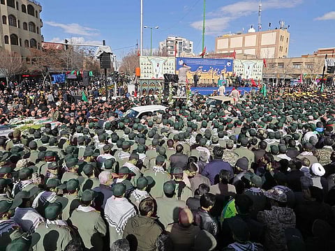 Members of Iranian revolutionary guards corps (IRGC) attend the funeral of fellow guards, who were killed in a suicide attack, in southeastern city of Isfahan
