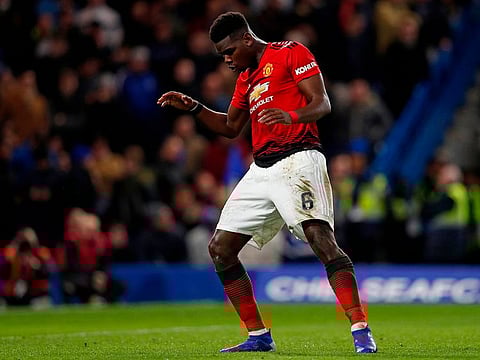 Paul Pogba celebrates after scoring United's second goal.