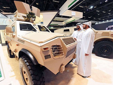 First Lt. Engr Abdullah Hussain Al Khoori and Mohammad Al Saadi from Abu Dhabi Police at a pavilion during Idex 2019.