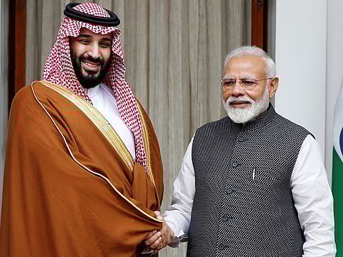Saudi Arabia's Crown Prince Mohammad Bin Salman shakes hands with India's Prime Minister Narendra Modi ahead of their meeting at Hyderabad House in New Delhi, on Wednesday, February 20, 2019.